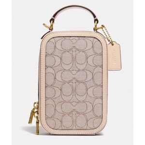 Authentic Coach Alie camera in signature canvas.